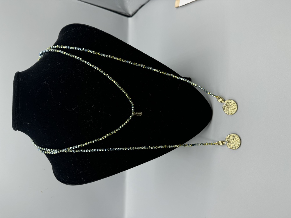 Heidi Daus lariat necklace.
